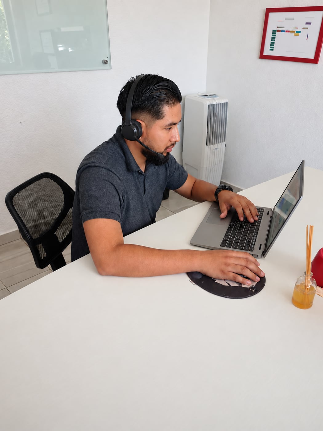 A ServTech Mexico engineer providing remote technical support.