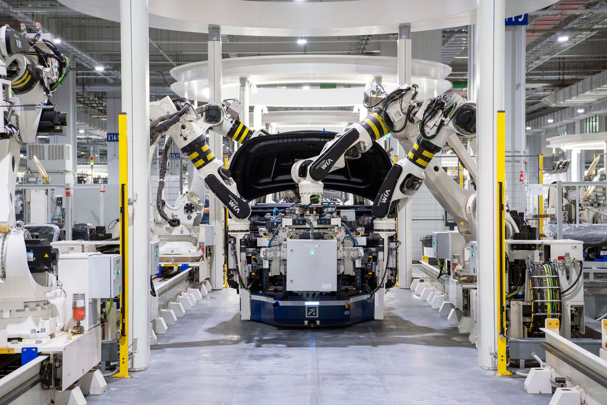 Robotic equipment on an automotive assembly line.