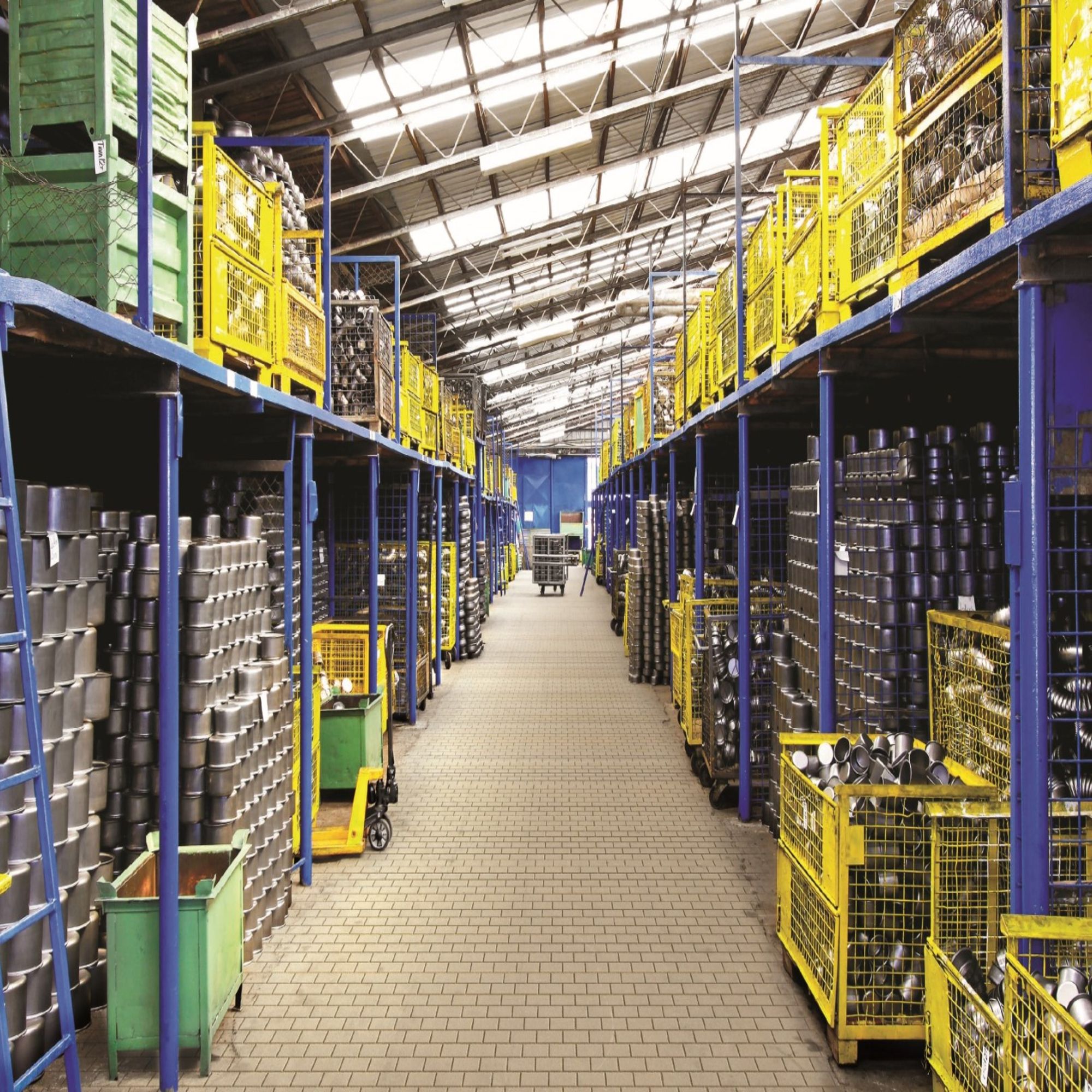 Shelving holding boxed spare parts in a stockroom.